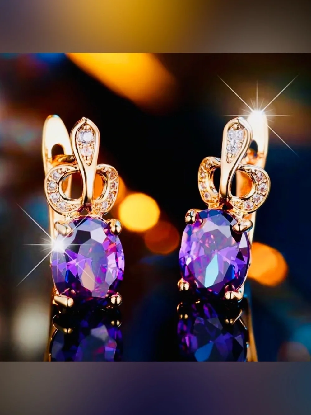 Gold-Tone Drop Earrings with Purple Oval Gemstones